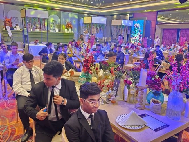 students at hotel industry event